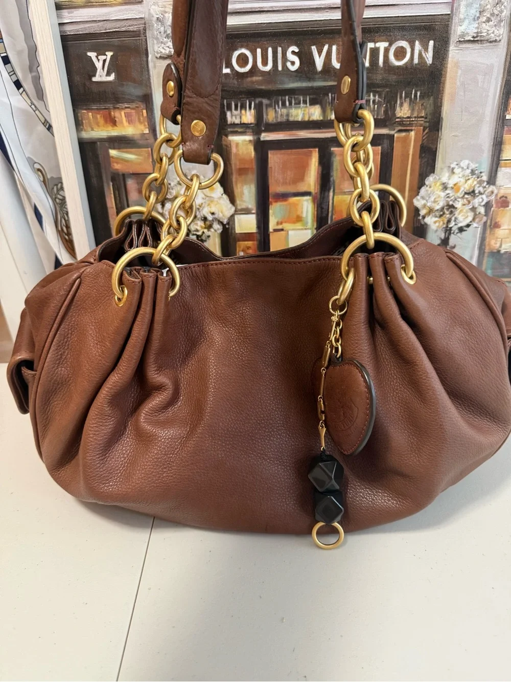 Juicy Couture Brown Leather Shoulder Bag with Gold Chain Accents